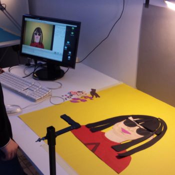 A student using technology to enhance their work in our Out of My Roots Student Art projects from Athena Syntax: an education programme that explores questions of identity through art.